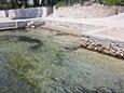 La plage  en ville Barbat, Rab.