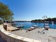 La plage  en ville Šimuni, Pag.