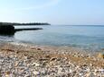 La plage  en ville Mareda, Novigrad.