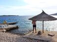 La plage  en ville Vitane, Pašman.