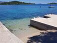 La plage  en ville Korčula, Korčula.