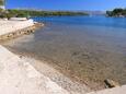 La plage  en ville Lumbarda, Korčula.