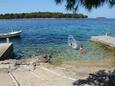 La plage  en ville Karbuni, Korčula.