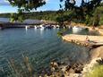 La plage Vela Riva en ville Bajčići, Krk.