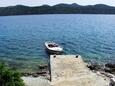 La plage  en ville Krknata, Dugi otok.