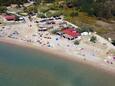 Nejbližší pláž Pláž Rajska plaža na místě Lopar, Rab.