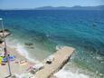 La plage  en ville Brist, Makarska.