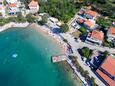 La plage Pećine en ville Šilo, Krk.