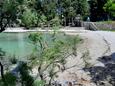 Der Strand Vela Luka im Ort Supetar, Brač.