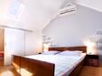 Спальня 2 Vodice, Спальня 2 в размещении типа apartment, доступный кондиционер, Домашние животные допускаются и WiFi.