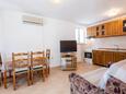 Dining room Lumbarda, Dining room in the apartment, air condition available and WiFi.