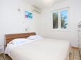 Pisak, Bedroom 1 in the apartment, air condition available, (pet friendly) and WiFi.