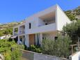 Hébergement Pisak, Omiš, Hébergement 1008 - Appartement à proximité de la mer avec une plage de galets.