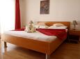 Orebić, Bedroom in the apartment, air condition available and WiFi.