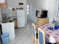 Dining room Nečujam, Dining room in the apartment, air condition available and WiFi.
