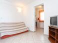 Sreser, Sala de estar in the apartment, air condition available y WiFi.