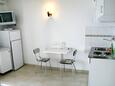 Dining room Pisak, Dining room in the studio-apartment, air condition available, (pet friendly) and WiFi.