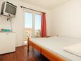 Orebić, Bedroom in the room, air condition available and WiFi.