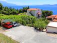 Marušići, Omiš, Parkeerplaats 1024 - Appartementen near sea with pebble beach.