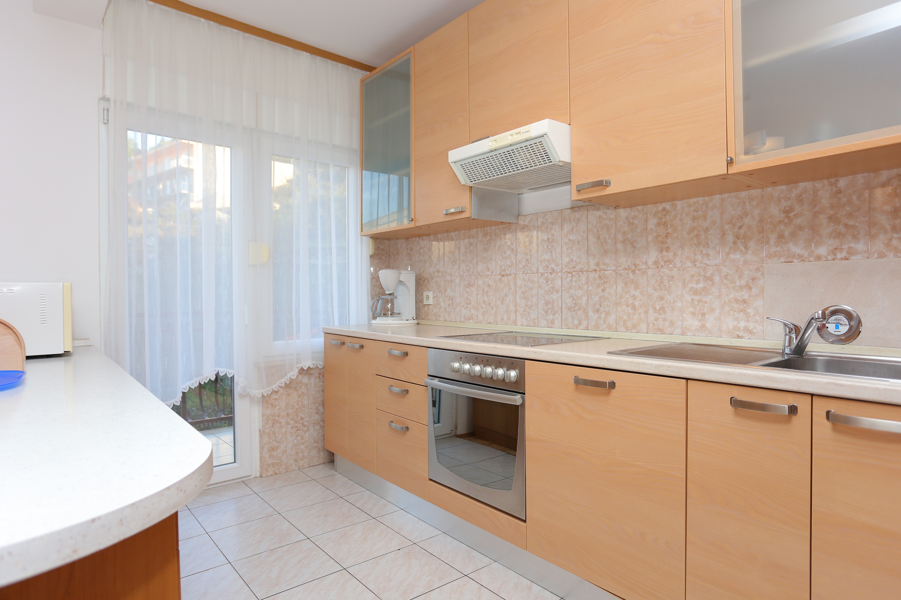 Četverosobni apartman s balkonom Podstrana, Split  A-b