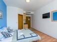 Mlini, Spavaća soba u smještaju tipa studio-apartment, dostupna klima, kućni ljubimci dozvoljeni i WiFi.