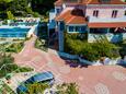 Mlini, Dubrovnik, Parkolóhely 10269 - Apartmanok kavicsos stranddal.