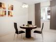 Stanići, Dining room in the apartment, air condition available and WiFi.