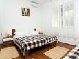 Trogir, Bedroom 1 in the apartment, air condition available and WiFi.