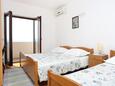 Bedroom 1 Stanići, Bedroom 1 in the apartment, air condition available and WiFi.