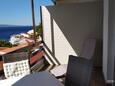 Marušići, Terrace in the apartment, with a sea view and WiFi.