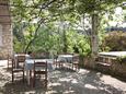 Pomena, Mljet, Tuin 10426 - Appartementen near sea with pebble beach.