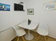 Hvar, Salle à manger dans l’hébergement en type apartment, climatisation disponible et WiFi.