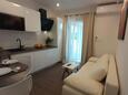 Obývací pokoj Mudri Dolac, Obývací pokoj v ubytování typu studio-apartment, s klimatizací a WiFi.