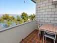 Arbanija, Balcony in the apartment, with a sea view and WiFi.