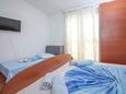 Rogoznica, Bedroom in the apartment, (pet friendly) and WiFi.