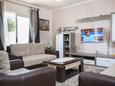 Living room 1 Makarska, Living room 1 in the house, air condition available, (pet friendly) and WiFi.