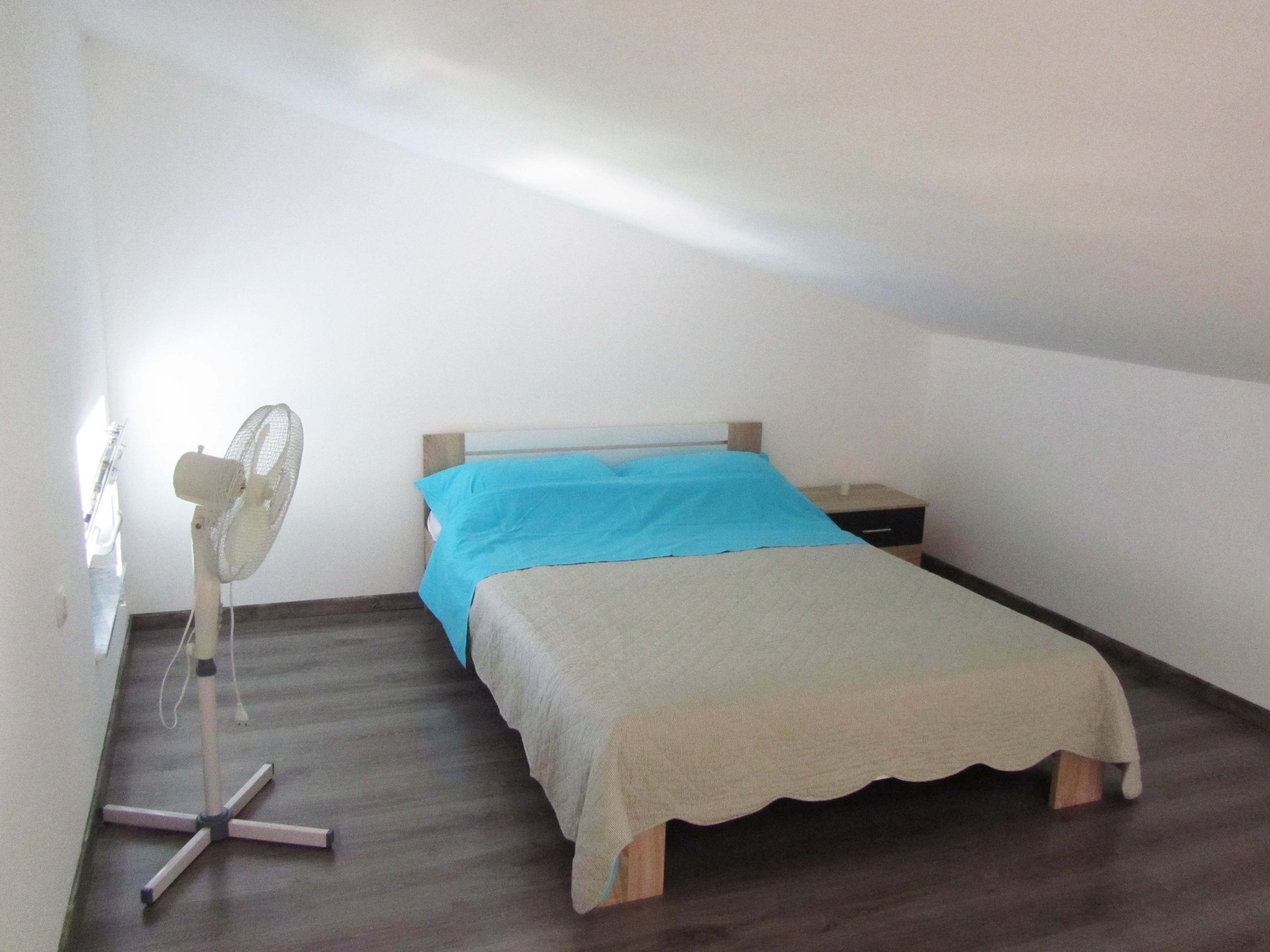 Two bedroom apartment with terrace and sea view Banjol, Rab  A-b