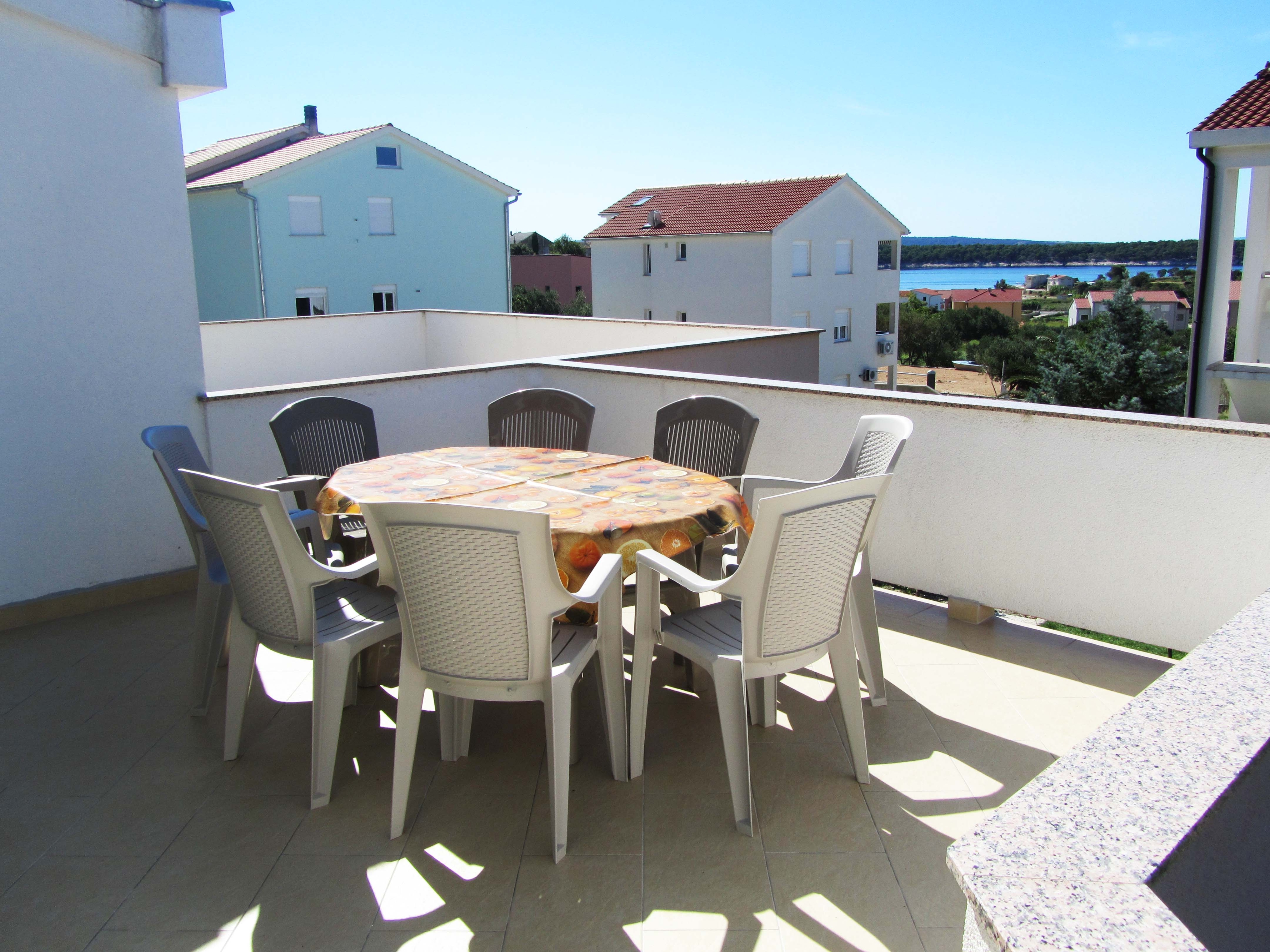Two bedroom apartment with terrace and sea view Banjol, Rab (A-11082-b) Two bedroom apartment with terrace and sea view Banjol, Rab (A-11082-b)