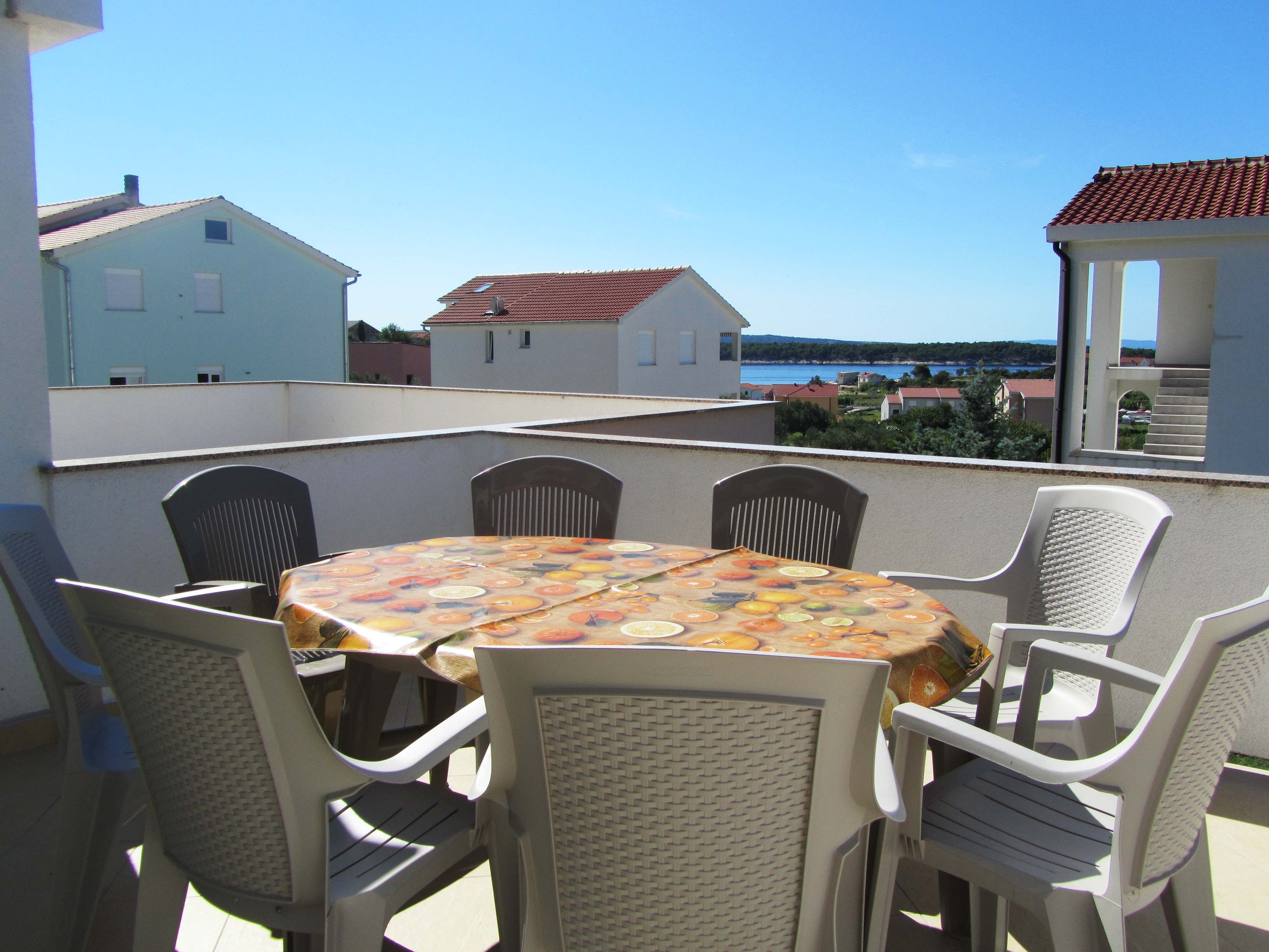 Two bedroom apartment with terrace and sea view Banjol, Rab  A-b