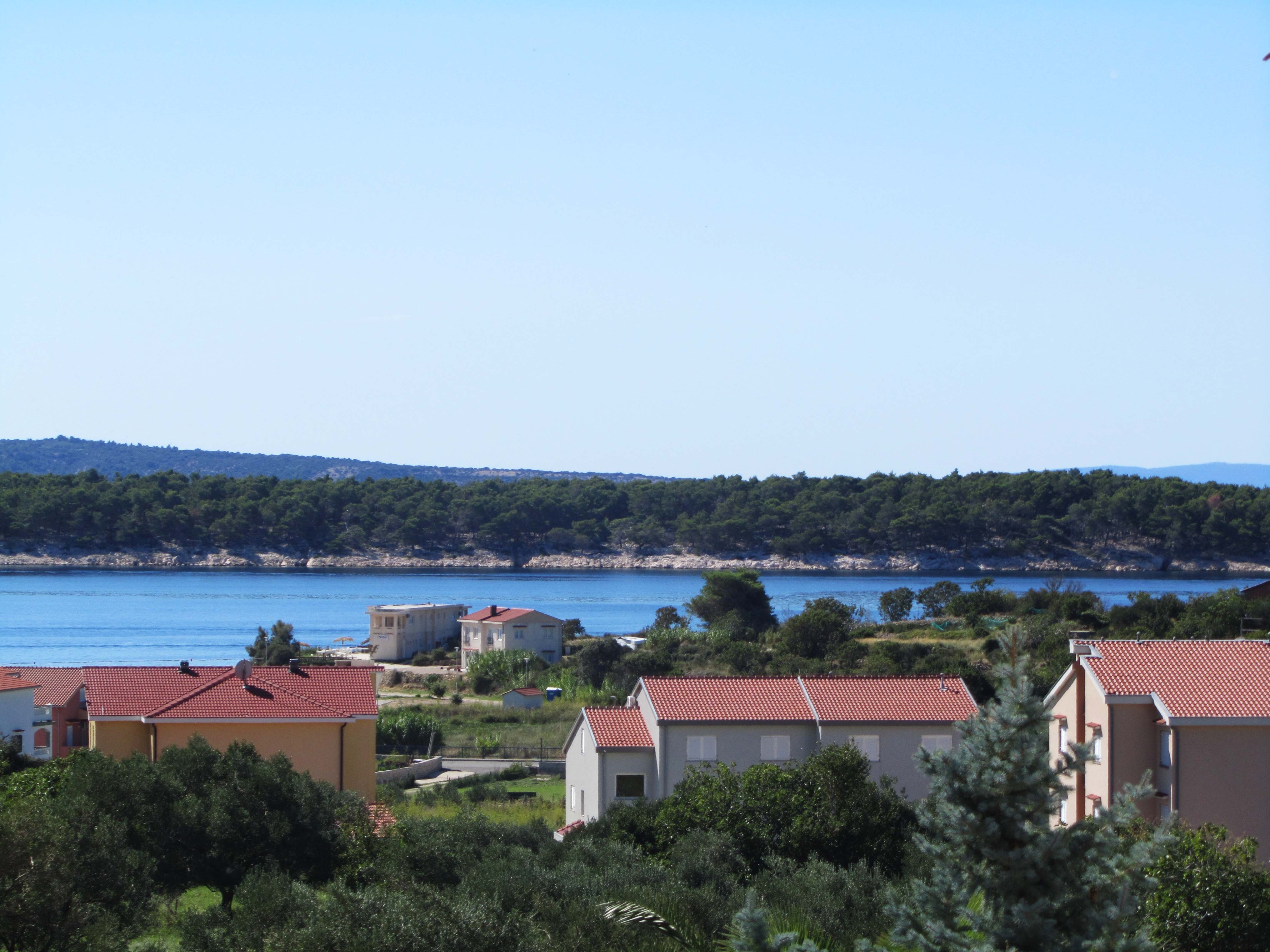 Two bedroom apartment with terrace and sea view Banjol, Rab  A-b