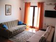 Obývacia izba Petrčane, Obývacia izba v ubytovacej jednotke apartment, klimatizácia k dispozícii a WiFi.