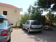 Parkiralište Mavarštica, Čiovo, Parkiralište 11208 - Apartmani sa šljunčanom plažom.