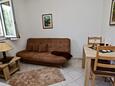Living room Sućuraj, Living room in the apartment, air condition available and WiFi.