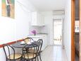 Dining room Bušinci, Dining room in the apartment, air condition available, (pet friendly) and WiFi.