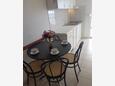 Dining room Bušinci, Dining room in the apartment, air condition available, (pet friendly) and WiFi.