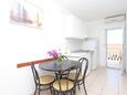 Dining room Bušinci, Dining room in the apartment, air condition available, (pet friendly) and WiFi.