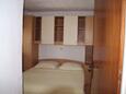 Bedroom 1 Lumbarda, Bedroom 1 in the apartment, (pet friendly) and WiFi.