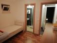 Sumartin, Ložnice 4 v ubytování typu apartment, domácí mazlíčci povoleni a WiFi.