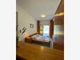 Ložnice Slatine, Ložnice v ubytování typu studio-apartment, s klimatizací a WiFi.