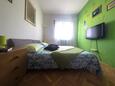 Spavaća soba 1 Trogir, Spavaća soba 1 u smještaju tipa apartment, dostupna klima i WiFi.